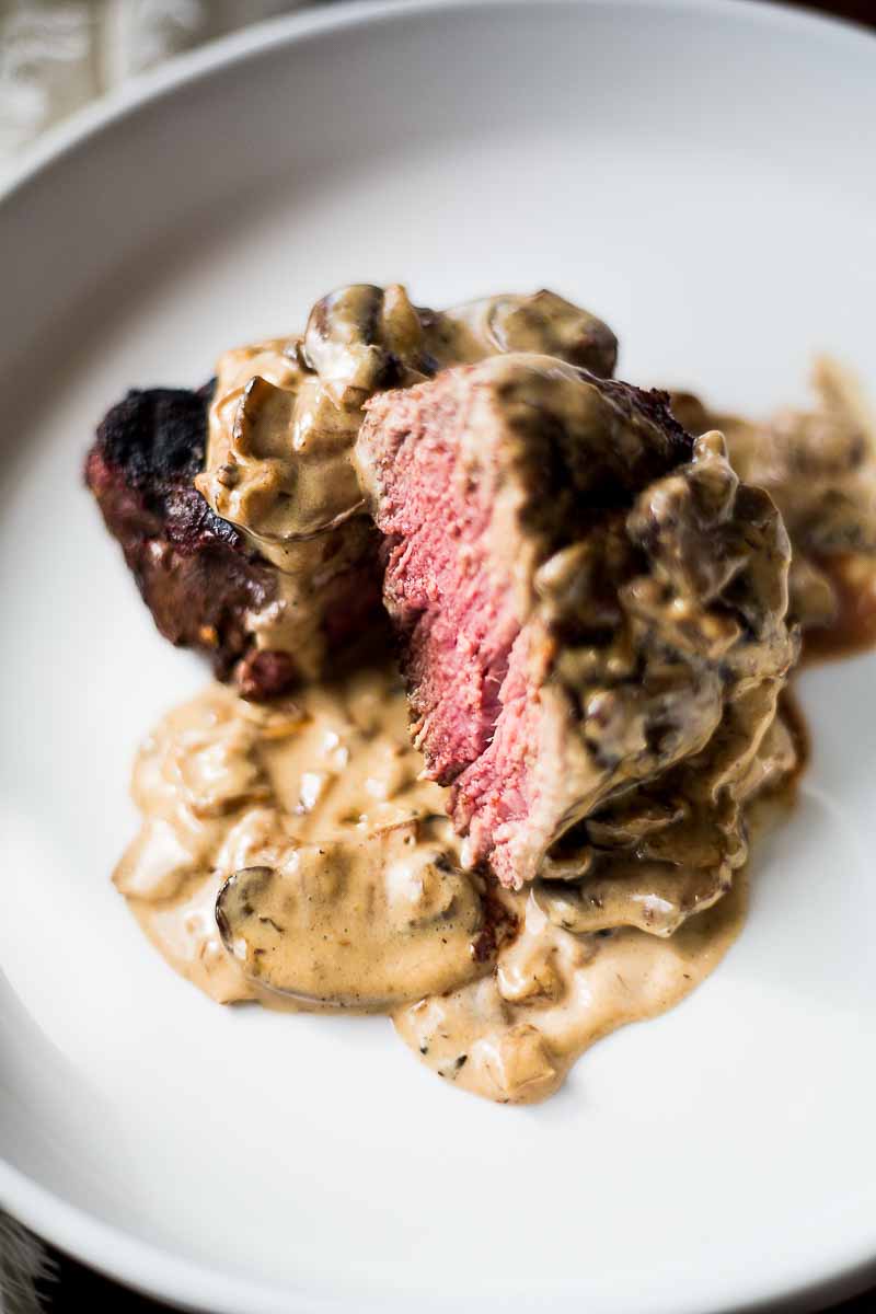 Medium Rare Steak with Whiskey Mushroom Cream Sauce